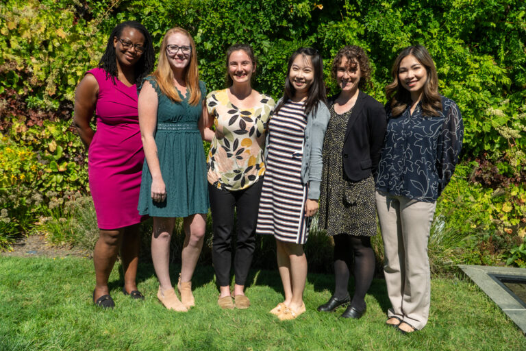 A photo of six people, a previous class of Family Nurse Practitioner Residents